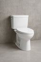 TOTO Drake 12 in Rough In Two Piece 1 6 GPF Single Flush Elongated Toilet in Cotton White SoftClose Seat Included MS776124CSFG 01