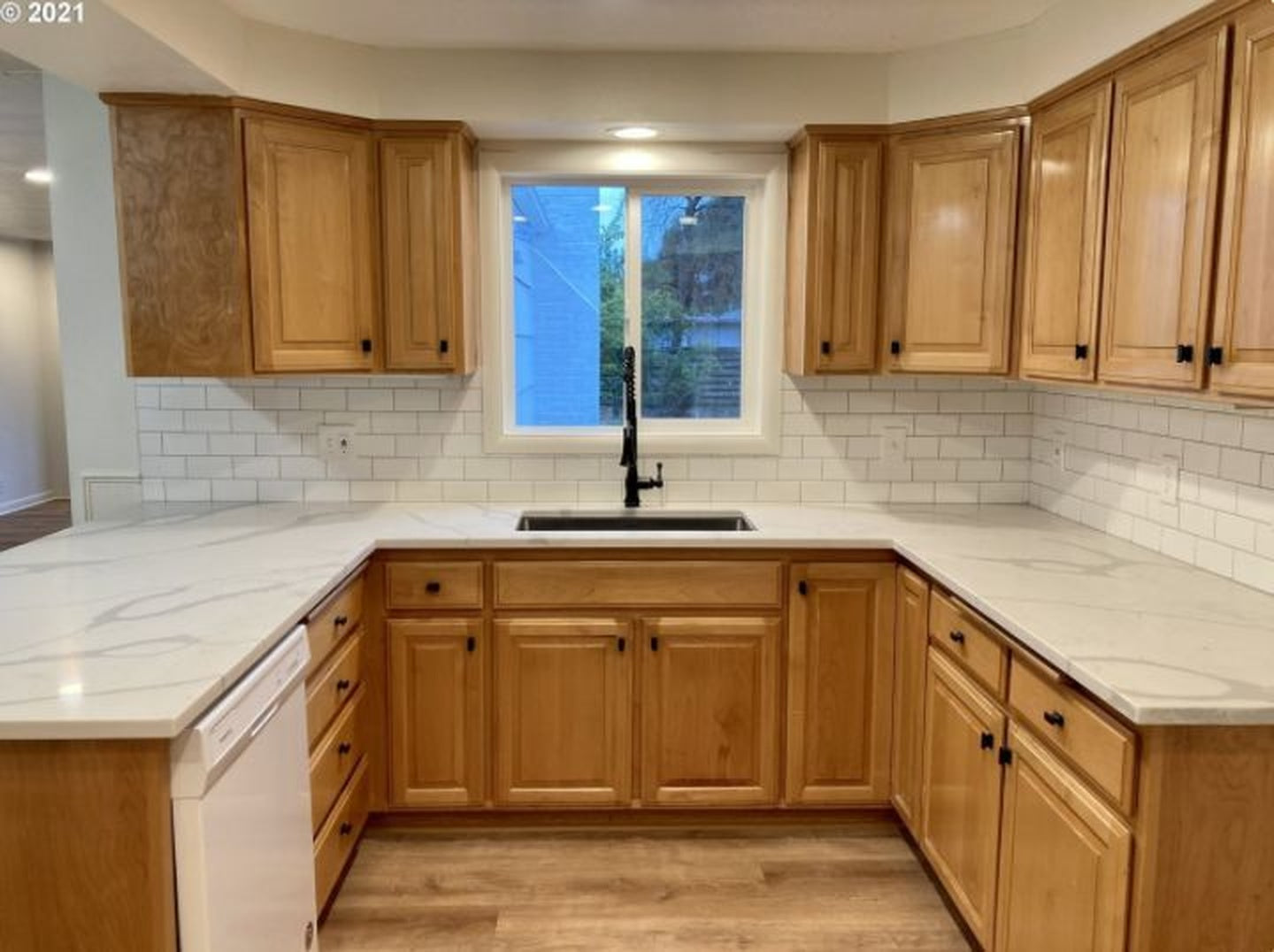Hampton Bay 9 in W x 24 in D x 34 5 in H Assembled Base Kitchen Cabinet in Unfinished with Recessed Panel