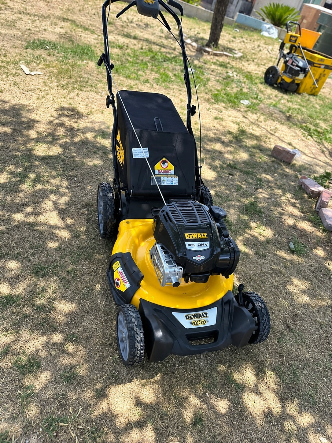 DEWALT 21 in 163cc Briggs and Stratton 725Exi Engine Rear Wheel Drive 3 in 1 Gas Self Propelled Walk Behind Lawn Mower 12AVP2R3739