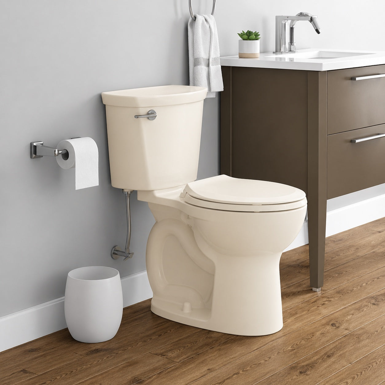 American Standard Cadet 12 in Antimicrobial 2 Piece 1 28 GPF Single Flush Chair Height Round Toilet in Bone with Slow Close Seat