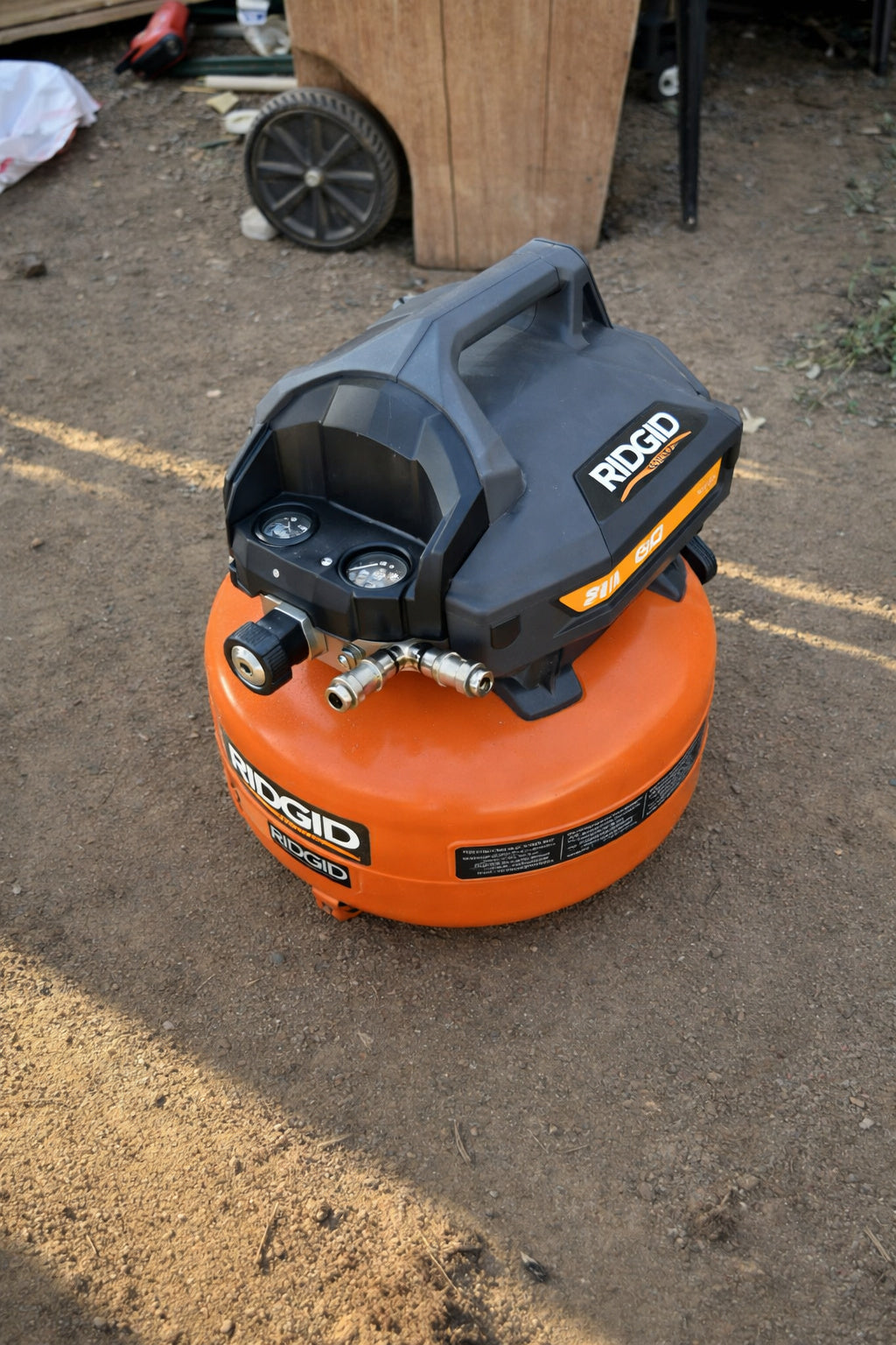 RIDGID 6 Gal 150 PSI Portable Electric Oil Free Jobsite Pancake Air Compressor with Dual Pressure Gauges and 2 Quick Couplers